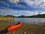 Abandoned Red Canoe