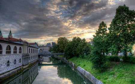 Ljublana after a Storm - storm, clouds, trees, office, buildings, church, architecture, canal, houses, bridge