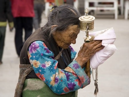 Tibetan Woman with Prayer Wheel - woman, prayer wheel, tibetan, pray, religious