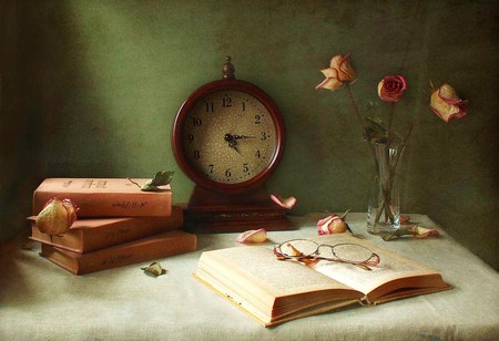 Reader's corner - roses, glasses, table, clock, books, vases