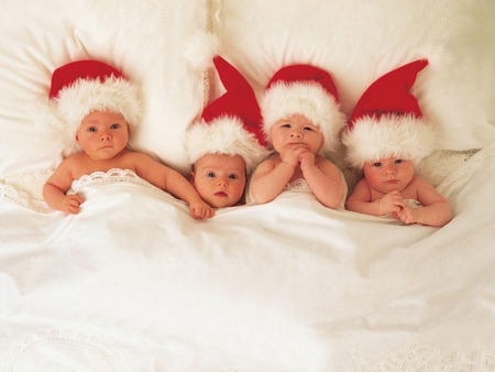 Santa Babies - santa, in bed, four, hats, babies