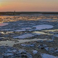 sunset-snowy terrain