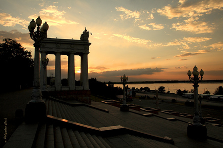 riverside columns - skyflares, arches, columns, sunset, bankside, moderate clouds, riverside, river, city, steps, streetlamps, orange, monument square, europe