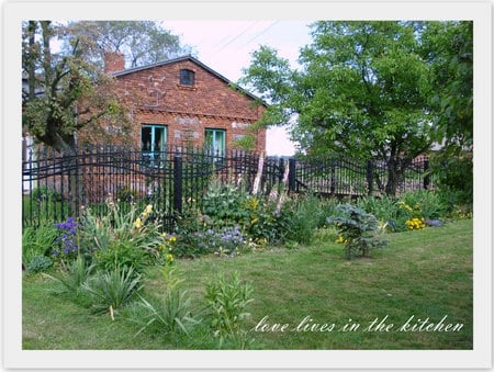 Flowers by the fence - fence, house, flowers, saying, garden, country