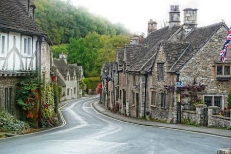 The Village - england, flowers, trees, hills, uk, stone buildings, road