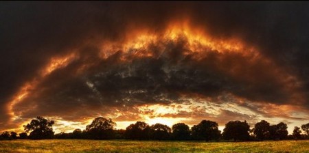 Fire Arch - clouds, trees, field, dark, sun