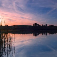 Misty lake at sunset