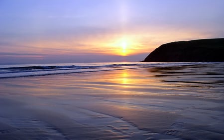 Beach footprints - sunset, coast, beach, shoreline, waves, footprints, sand, mountain