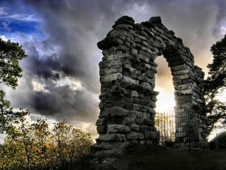 THE MAJESTIC STONE ARCH - plants, fence, clouds, arch, majestic, stone