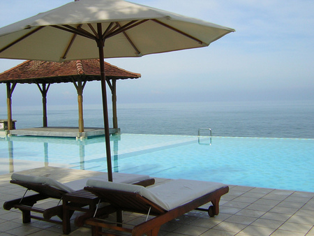 Sri Lanka - umbrellas, ocean, chairs, pool, deck