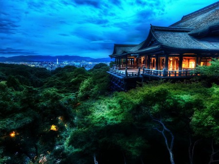 Kyoto in the Background - sky, trees, traditional, view, home, japan, clouds, sunsets, green, house, tree, branches, forests, landscape, light, night, asian, nature, roof, forest, blue, beautiful, city, kyoto, lights