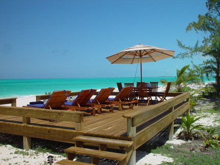 The Party Place! - chairs, sea, deck, umbrella