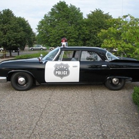 old car police car