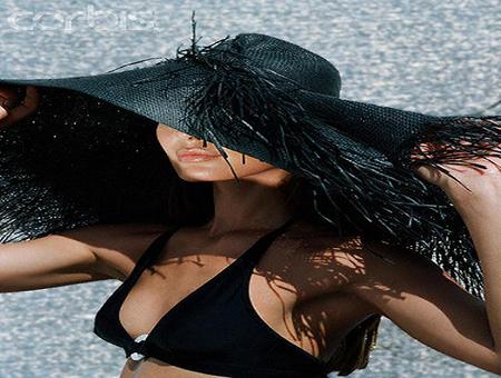 The black hat - woman, black hat, ocean, feathers, halter top