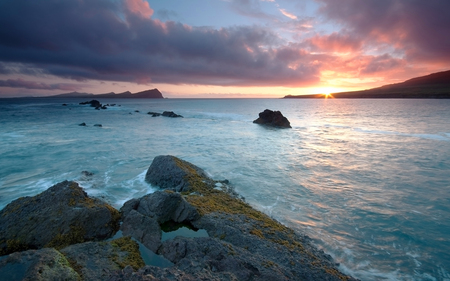 Sunset at Three Sisters - calm, clouds, beach, beautiful, rock, colors, ocean, reflection, sunset, mountains, sky