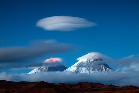 Eruption - mountain, eruption, snow, white clouds, glowing hot, blue sky, land, mist