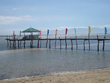 a time to refresh - sky, beach, sun, bridge, sand, flags