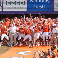 Clemson Tigers run down Hill