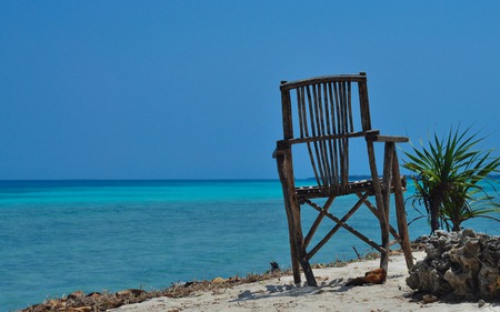 Heaven in Zanzibar - coastline, water, blue, beautiful, beaches, ocean, chair, nature, aquamarine, clear, sky