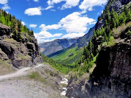 Rocky mountains - river, hills, boulders, road, mountains, colorado, sky