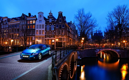 Beautiful - town, blue, night, reflection, car, streets, canal, houses, sky, house, trees, water, honda, beautiful, lanterns, road, amsterdam, city, beauty, colors, architecture, buildings, street, colorful, river, nature, lights, peaceful, bridge, building