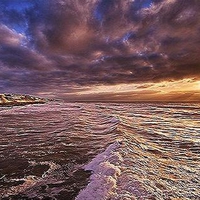 Surf, sand, sun and sky