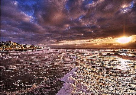 Surf, sand, sun and sky - ocean, trees, cloudy sky, sunset, reflection of sun, sand, waves