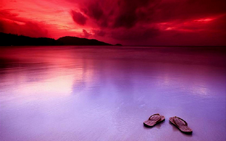 SANDALS ON THE BEACH