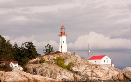 The Lighthouse - trees, rocky, coastline, outcrop, lighthouse, architecture, cloudy, installations