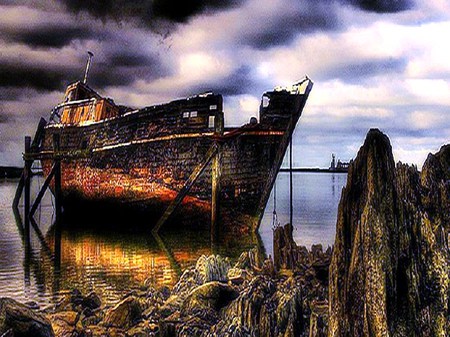 Passing of time - disrepair, ocean, ruins, old, decay, rocks, boat