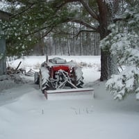 snow covered tractor