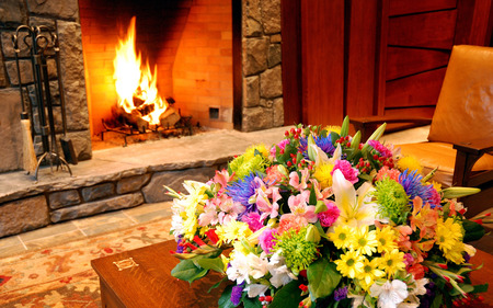 Fireplace - nice, beauty, room, colorful, fire, floral arrangement, wood, flame, brown, home, modern, pretty, arrangement, table, architecture, family, house, cute, board, nature, chair, furniture, warm, beautiful, sweet, flowers, flower