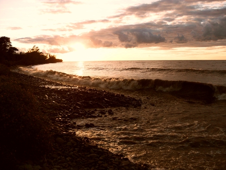 Stoney Beach - water, lake, sunset, sun