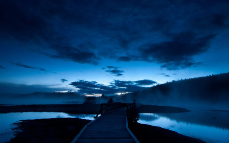 YELLOWSTONE SUNSET - mountains, yellowstone, water, blue, sky, clouds, pier, trees, sunset