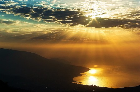 Golden rays - clouds, shore, rays of light, blue sky sunset, reflection on water, golden water