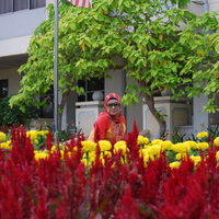 women behind the flower
