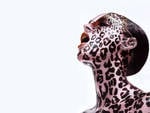 woman-with-leopard-spots-tattoos-on-face