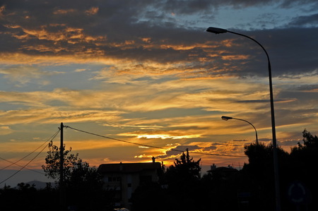 the day is over - shadows, sunset, town, golden sky