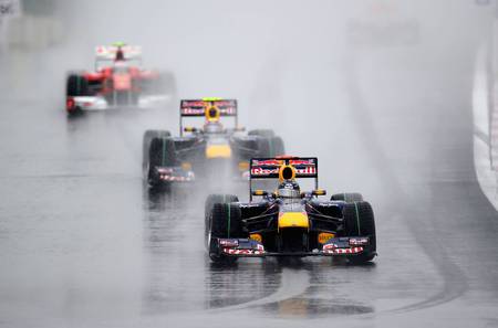 Three in a Row - rain, wet, korean, grand prix, race, car, formula 1, red, ferrari, bull