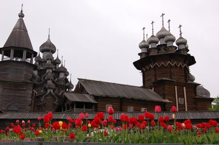 Church - beauty, russia, tulips, church, beautiful, red, leaves, architecture, tulip, flowers, grass, religious