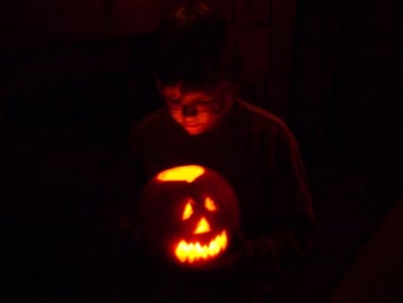 Boy and Jack-O-Lantern - boy, night, light, jack-o-lantern