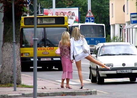 A beautiful way to stop the bus - blonde, bus, women, car