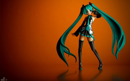 Hatsune Miku - pretty, tie, anime, vocaloid, blue, twintail, hatsune miku, nice, idol, realistic, skirt, beautiful, girl, thighhighs, beauty, cool, orange, black, grey, miku, awesome, diva, model, figurine, cute, hatsune, vocaloids