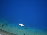 A boat floating on the sea in Hawaii