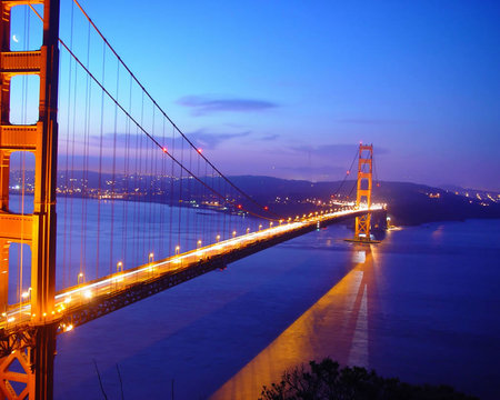 Golden bridge - beauty, places, arhitecture, popular, water, nights, reflection, blue, orange, colors, bridge, lights