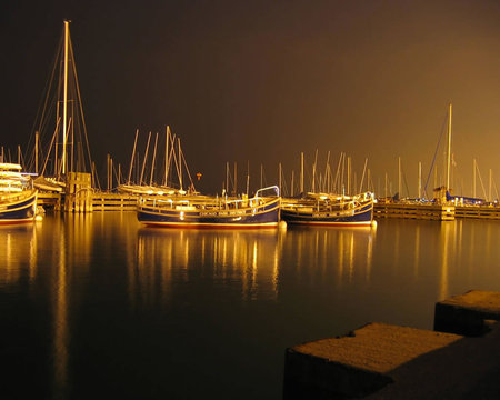 Golden boats - water, beauty, colors, ocean, nights, reflection, sailboats, boats, popular, shore, lights