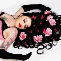 BEAUTIFUL WOMAN WITH ROSES IN HER HAIR..