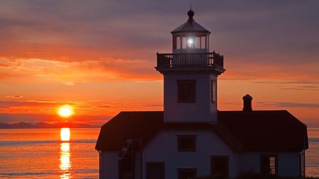 Lighthouse At Patos Island - lighthouse, sky, scenic, beacon, sun, sunset, nature, glowing, blue, beautiful, red, sea, dusk