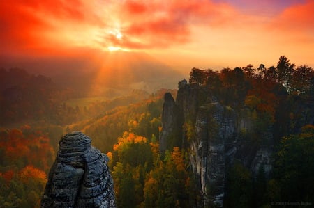 Cliffs in the sunset - trees, forest, orange sky, sunset, cliffs, sun rays