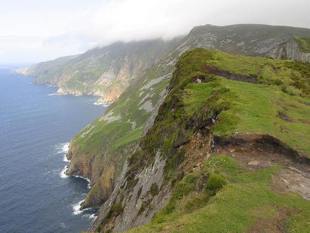 Wild Coast of Ireland - sky, grey, vegetation, steep, sea, caost